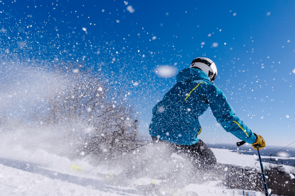 Person carving into the snow at Spirit